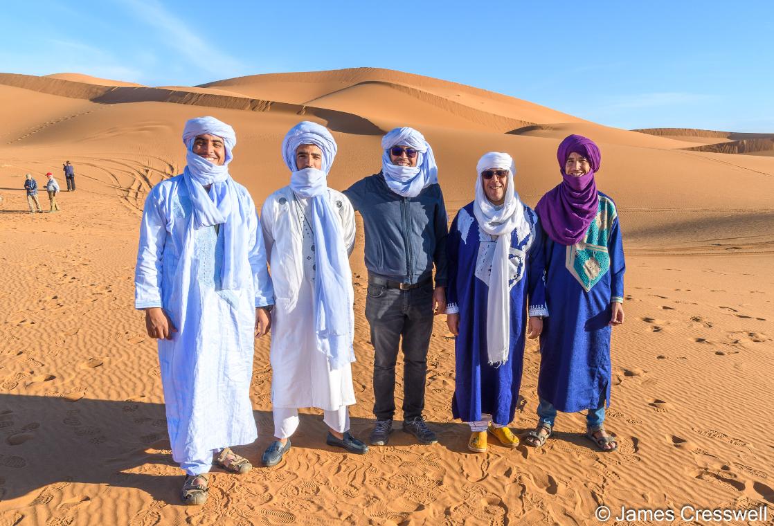 A photograph of Youssef  and team in the Erg Chebbi dunes