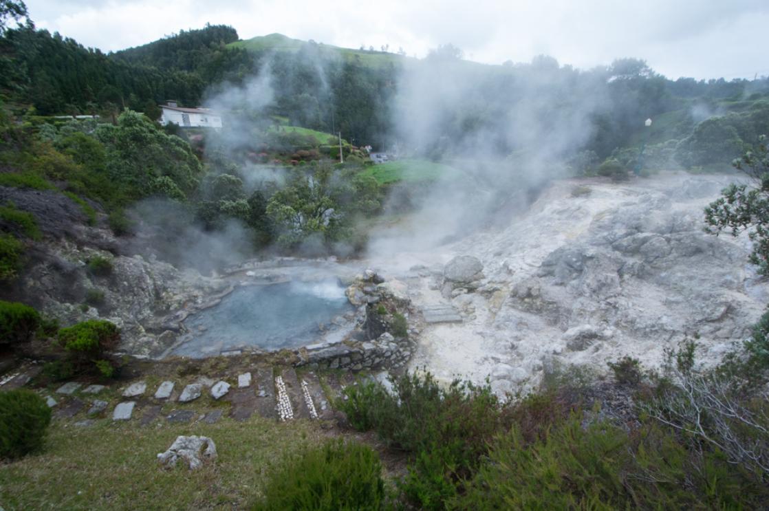 A photograph of steaming fumeroles taken at  Furnas, Sao Miguel, geology tour of the Azores by GeoWorld Travel