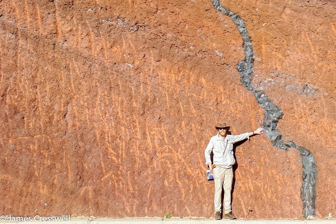 James and a dyke cutting through compacted backed scoria on La Gomera