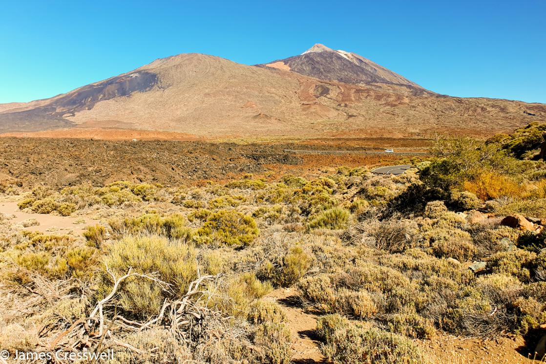 Inside Las Canadas Caldera, in the Teide World Heritage Site. The peak of Teide is in the background with Pico Viejo in the foreground