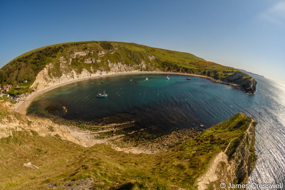 A photograph of Lulworth Cove in the Jurassic Coast World Heritage Site  taken on a GeoWorld Travel geology tour and holiday of England and Wales