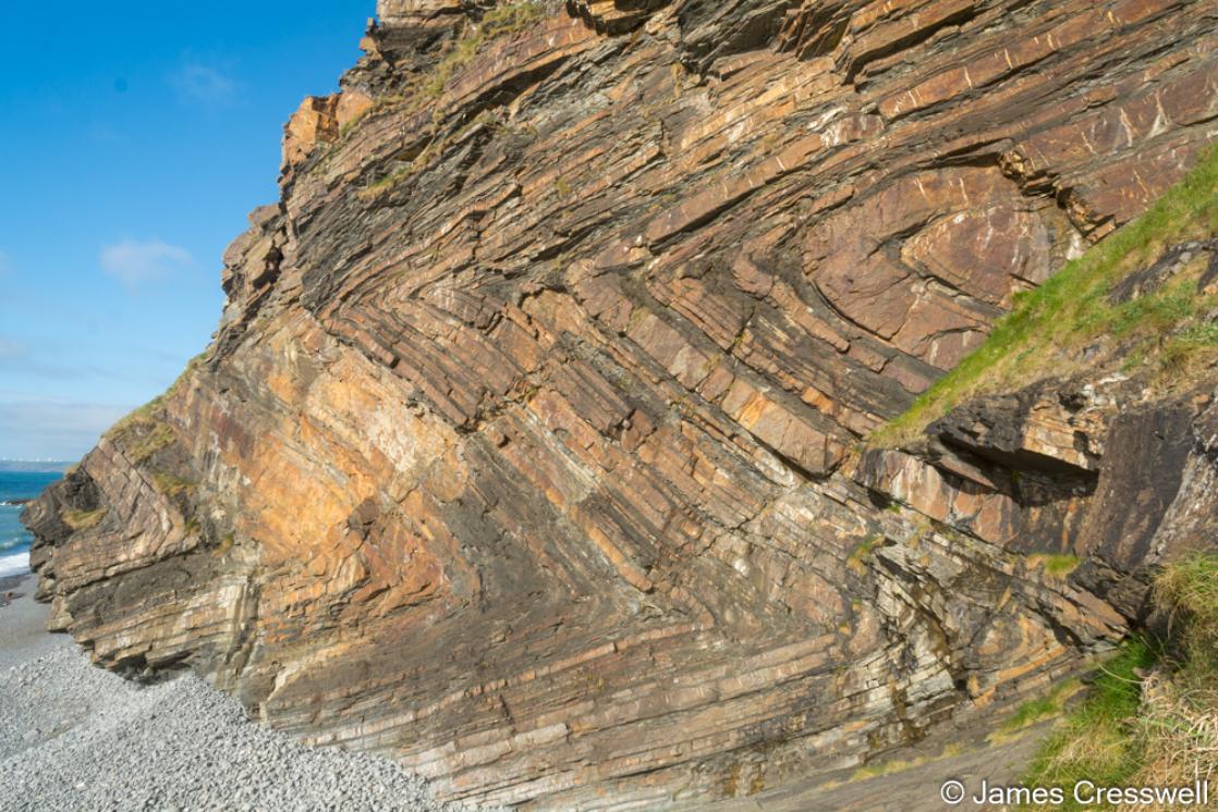 A photograph of chevron folds at Millook Haven, Cornwall  taken on a GeoWorld Travel geology tour and holiday of England and Wales