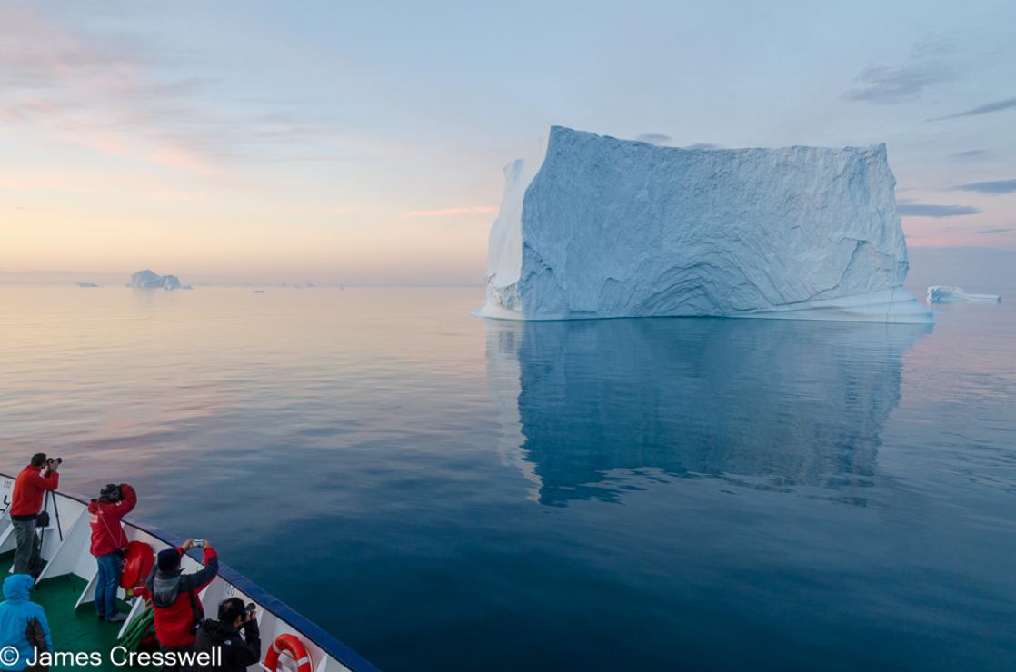 A photograph of an iceberg in Scoresbysund, East Greenland