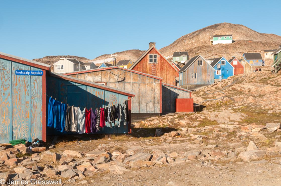 A photograph of Ittoqqortoormiit also known as Scoresby Sund. It is the only settlement in northeast Greenland. Taken on a PolarWorld Travel polar expedition cruise