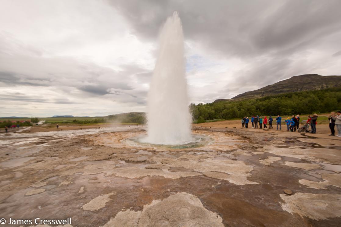 A photograph of an erupting geyser, the Strokkur Geyser, taken on the GeoWorld Travel Iceland geology trip and volcano holiday