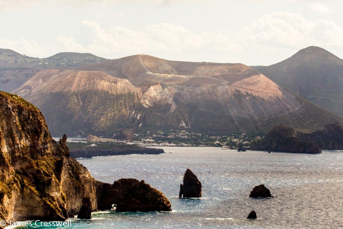 A photograph of the volcano island Vulcano as viewed from Lipari, taken on a GeoWorld Travel geology trip and volcano tour
