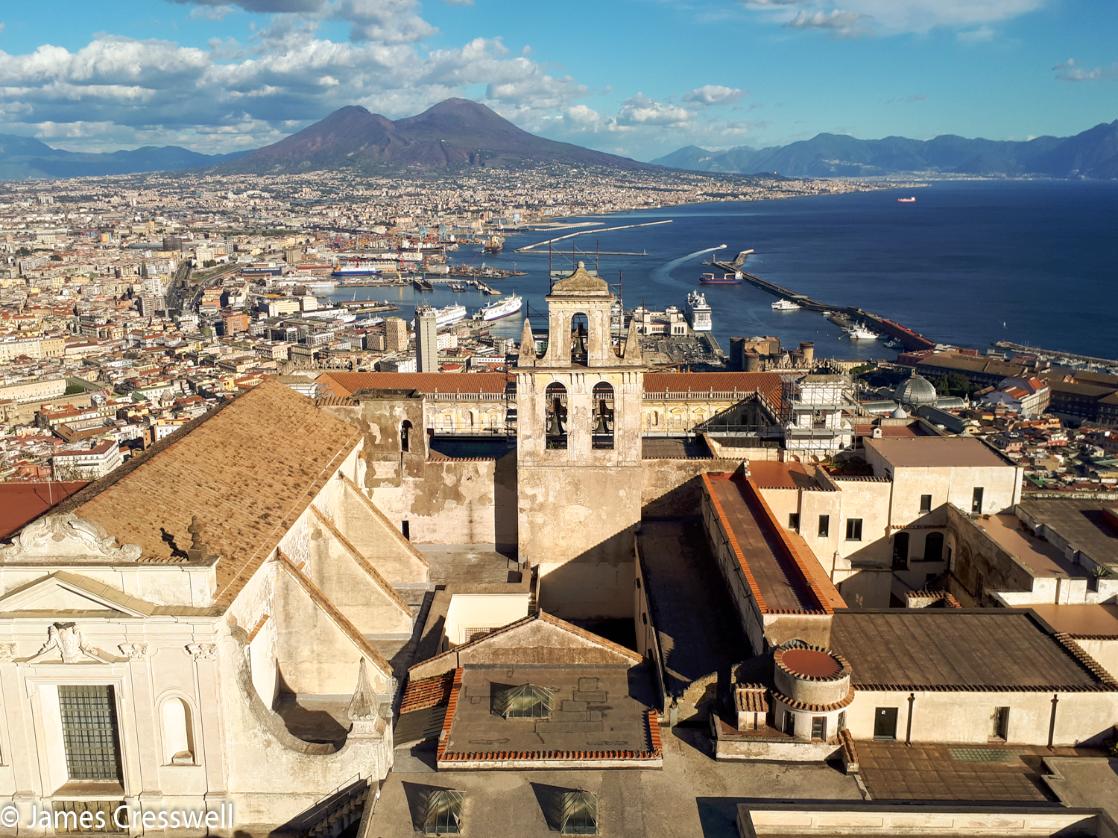 A photograph of Naples with Vesuvius volcano in the background, taken on a GeoWorld Travel geology trip and volcano holiday