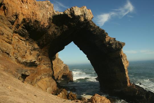 A photograph of a rock arch