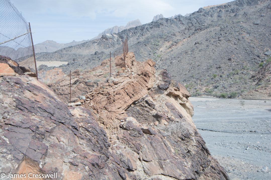 A photograph of cap carbonates overlying Snowball Earth deposits, taken on a GeoWorld Travel Oman geology trip, tour and holiday