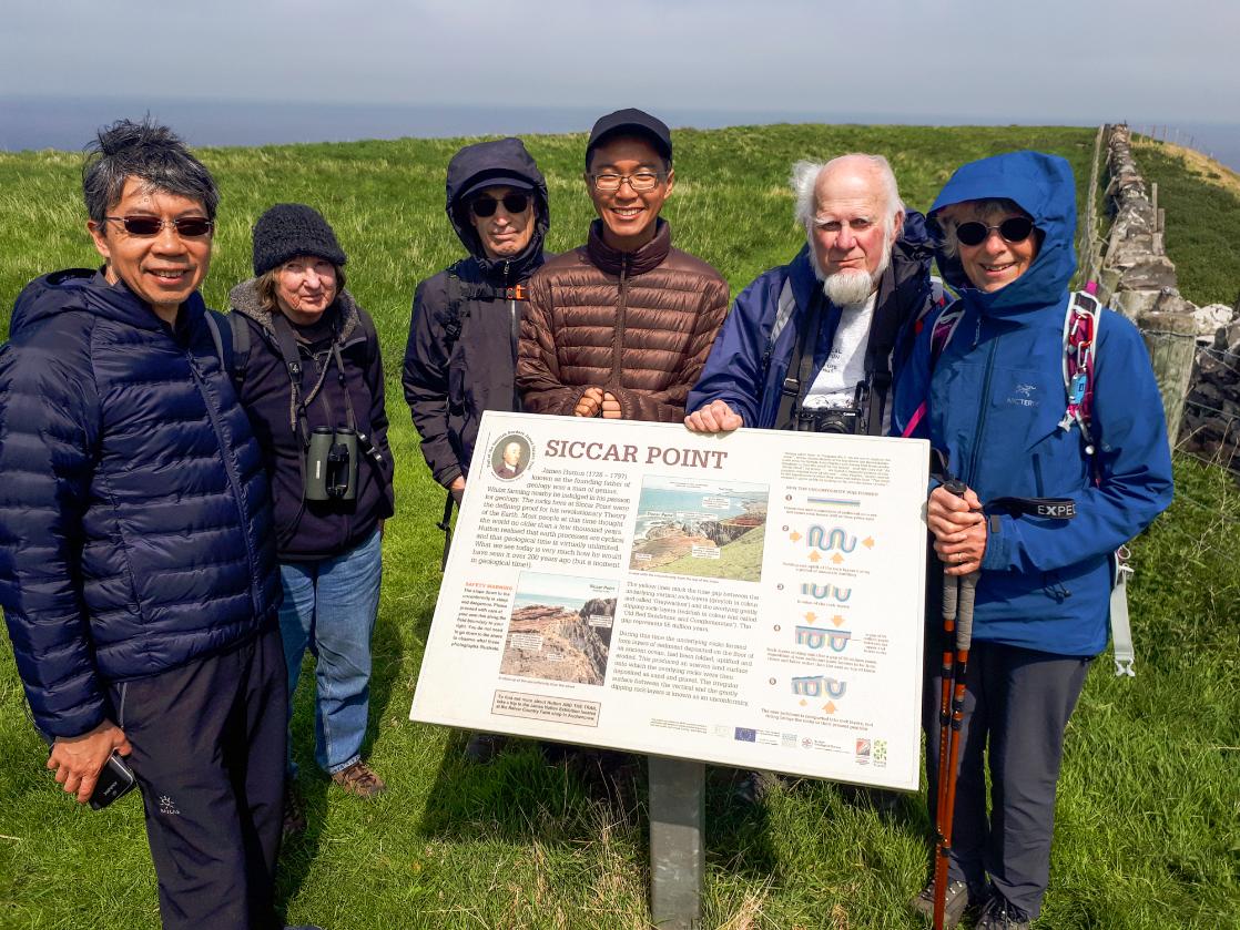 A GeoWorld Travel group at Siccar Point, Scotland 