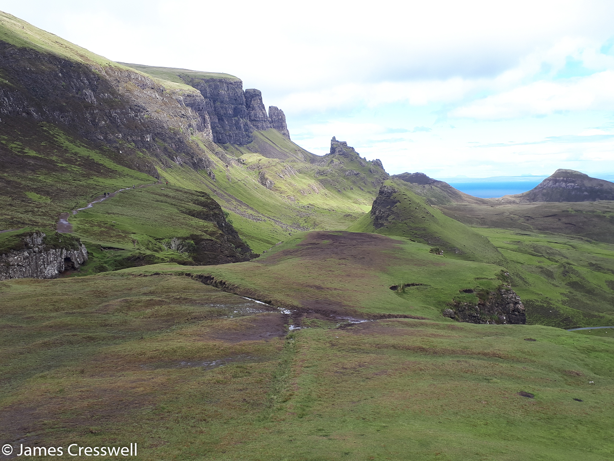 A photograph of rocky pinnicles, the Quiraing and Trotternish landslip, on the Isle of Skye, taken on a GeoWorld Travel Scotland geology trip, tour and holiday