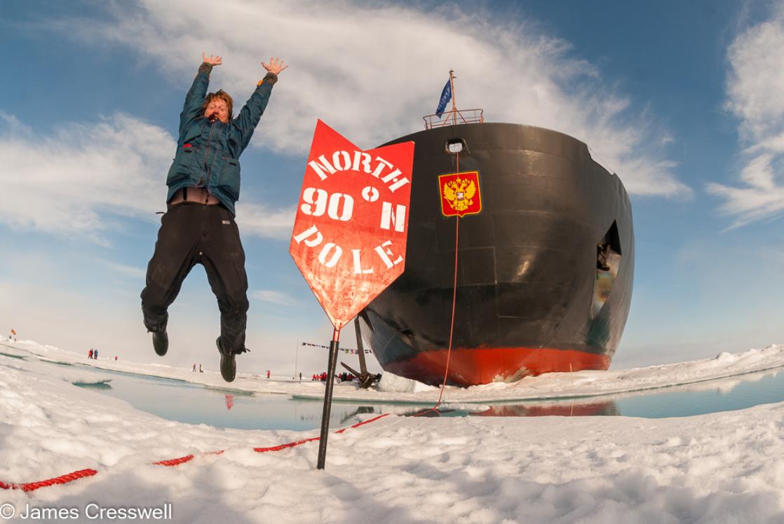 Geologist James Cresswell jumps for joy at the Geographic North Pole