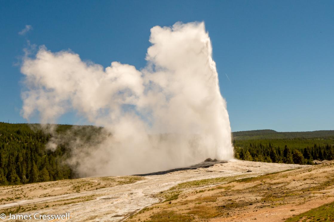A photograph of Old Faithful geyser in Yellowstone National Park, taken on a GeoWorld Travel USA geology trip, tour and holiday