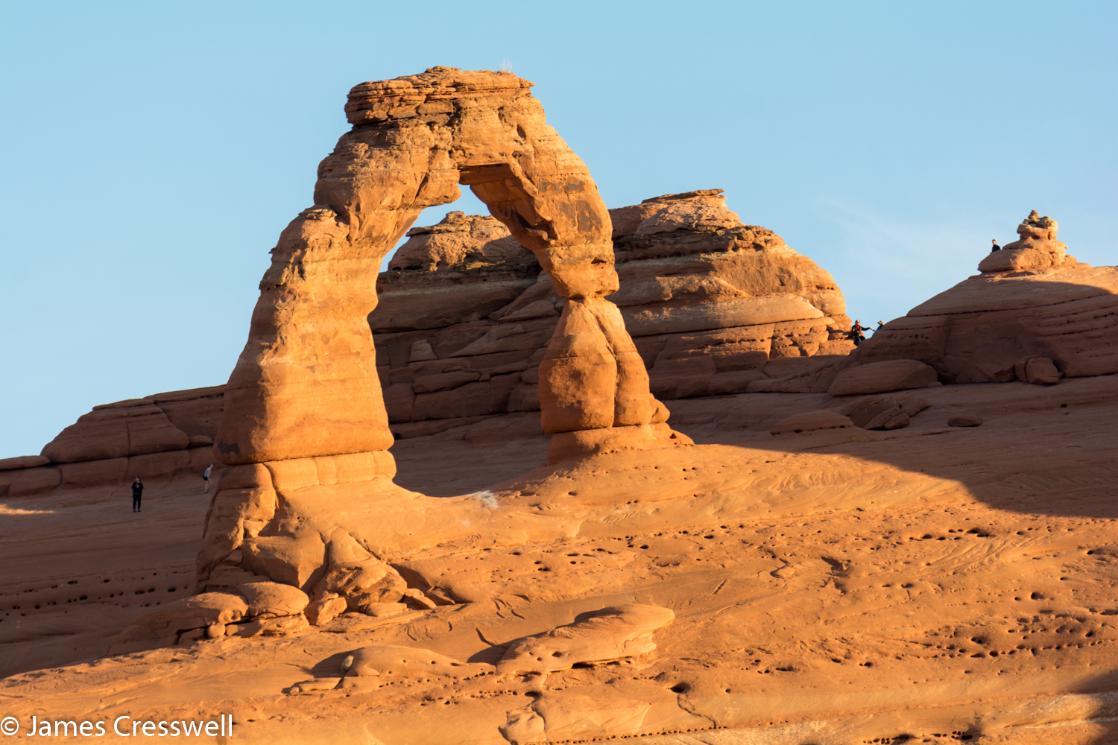 A photograph of Delicate Arch in Arches National Park, taken on a GeoWorld Travel USA geology trip, tour and holiday