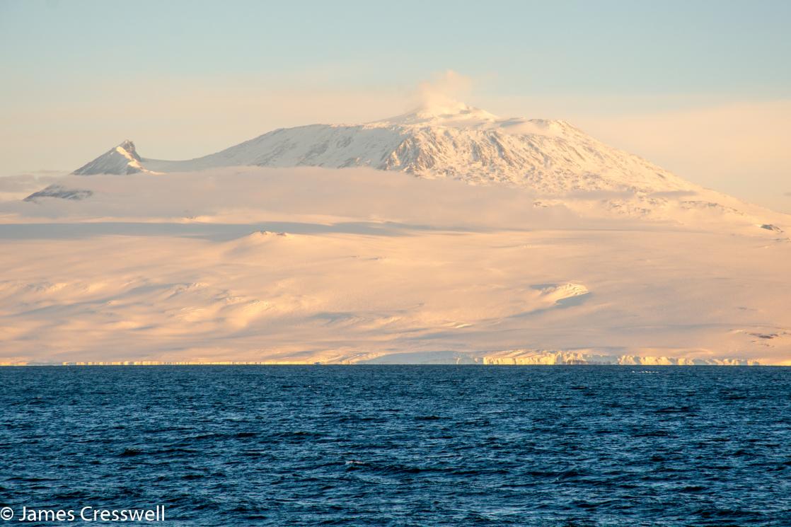 A photograph of Mt Erebus volcano in Antarctica, taken on a PolarWorld Travel placed expedition cruise