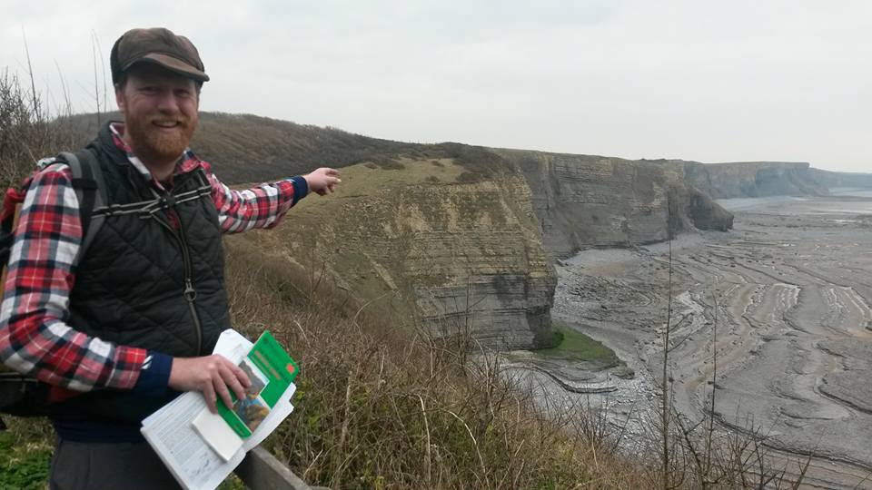 James Cresswell explaining the view from Trwyn y Witch headland. GeoWorld Travel geology fieldtrip
